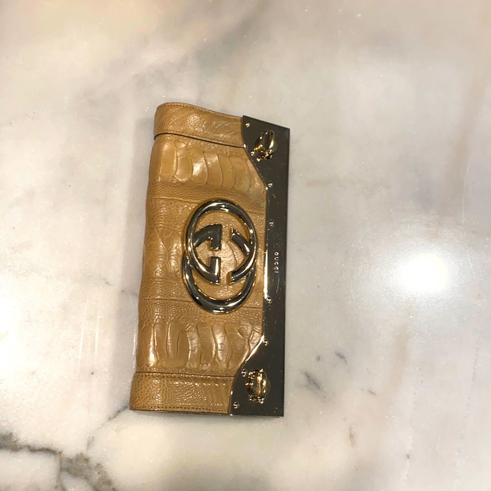 Gucci ostrich gold clutch